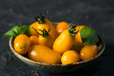 Close-up of fruits in bowl on table