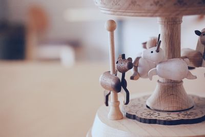 Close-up of figurines on table