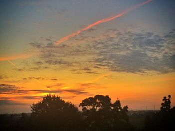 Scenic view of dramatic sky at sunset