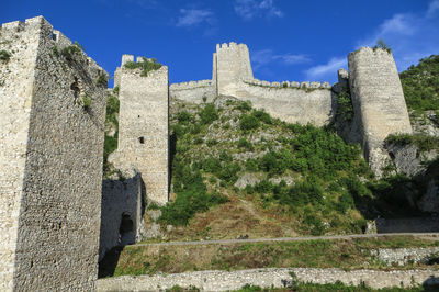 Low angle view of fort against sky