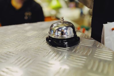 Close-up of glasses on table in restaurant