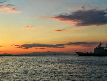 Scenic view of sea at sunset