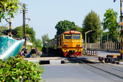 Train on railroad track against sky