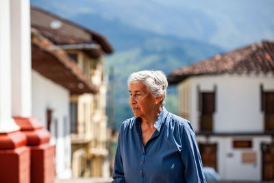 Senior woman tourist at the heritage town of salamina in the department of caldas in colombia