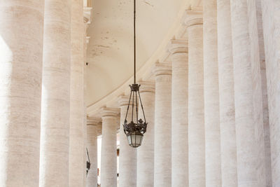 Low angle view of electric lamp on building