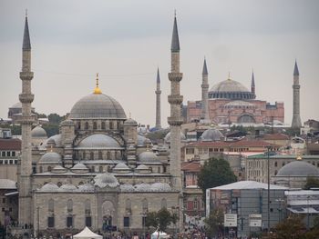 Sultan ahmed mosque and hagia sophia against cloudy sky