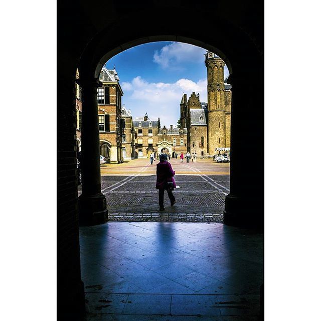 WOMAN WALKING IN CITY