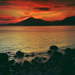 Scenic view of mountains at sunset