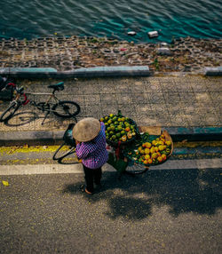 Fruit vendor in a street in hanoi.