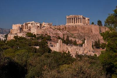 Low angle view of old ruins against clear sky