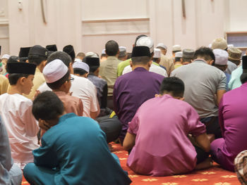 Rear view of people at temple