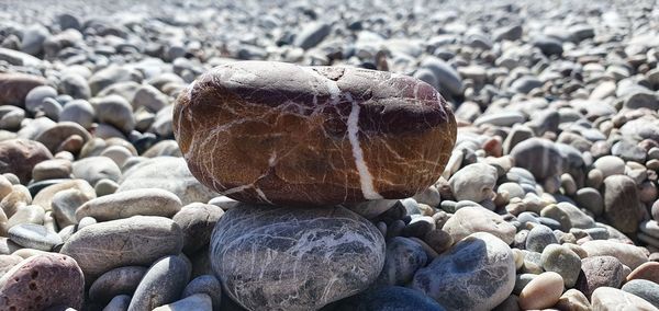 Close-up of stones on beach