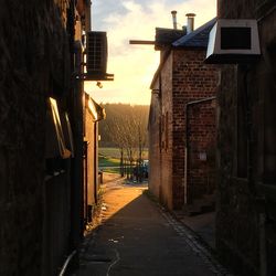 Narrow alley along buildings
