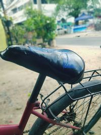 Close-up of bicycle on road