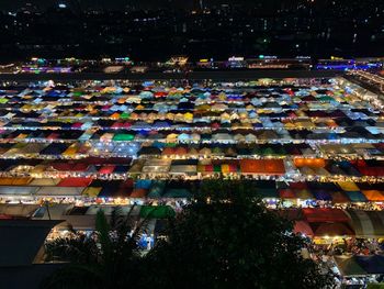 High angle view of illuminated buildings at night