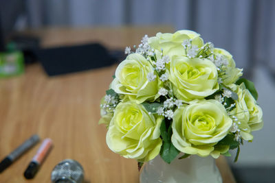 Close-up of rose bouquet on table