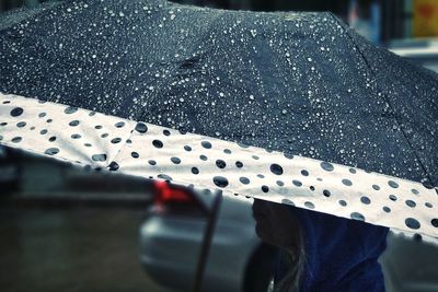 Close-up of a car on road