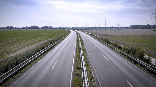 Aerial view of highway against sky