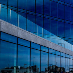 Reflection in bestseller headquarters glass facade