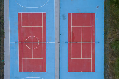 Aerial view from a drone, two tennis courts