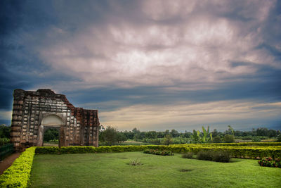 Old ruin building against cloudy sky