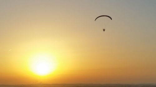 Scenic view of sea against clear sky during sunset