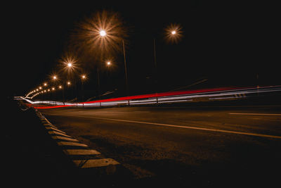 Light trails on road at night