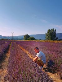 Person working on field against sky