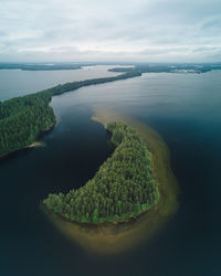 High angle view of sea shore against sky