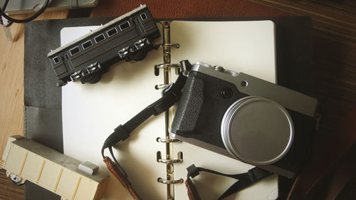 High angle view of camera on table