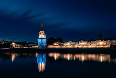 Panoramic view of the old harbor of la rochelle at blue hour with its famous old towers