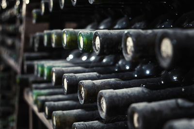 Close-up of old wine bottles
