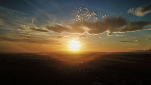 Scenic view of silhouette landscape against sky during sunset