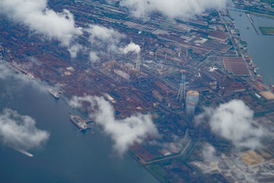 Aerial view of cityscape against sky