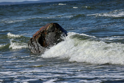Sea waves splashing on shore