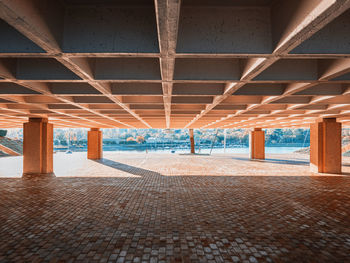 Interior of empty footpath by building