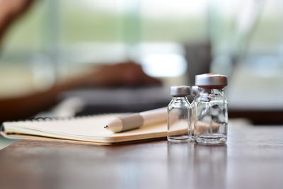 Close-up of glasses on table