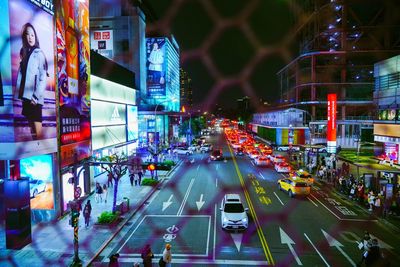 High angle view of traffic on road at night