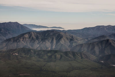 Aerial view of mountains in foggy weather