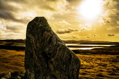 Scenic view of landscape at sunset