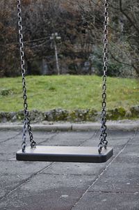 Empty swing in park