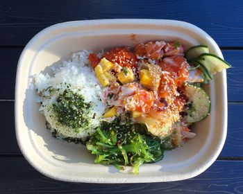 High angle view of poké bowl on table