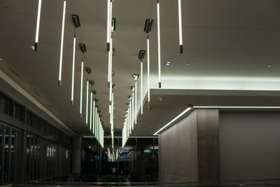 Low angle view of illuminated lights in building