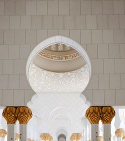 View of white art on table against wall