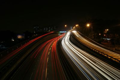 High angle view of light trails on street at night