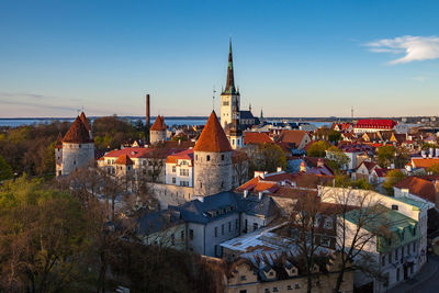 View of town against blue sky