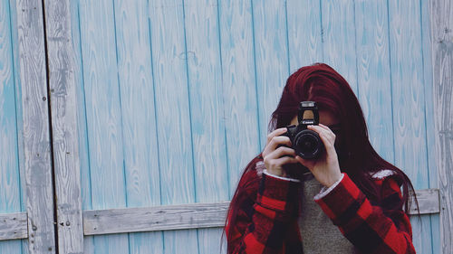 Man photographing with camera