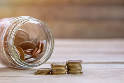 Close-up of coins on table