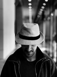 Man wearing hat indoors