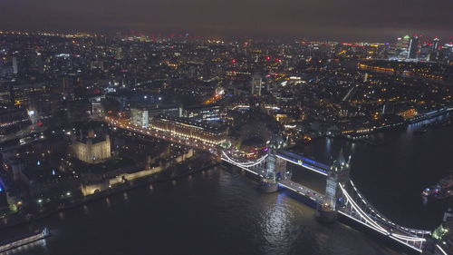 High angle view of illuminated city at night